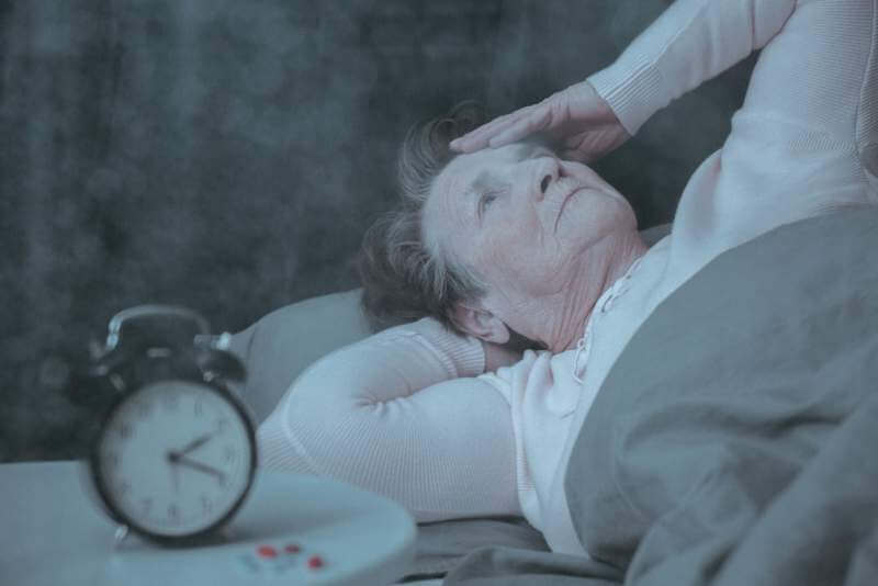 senior-woman-having-sleep-disorder
